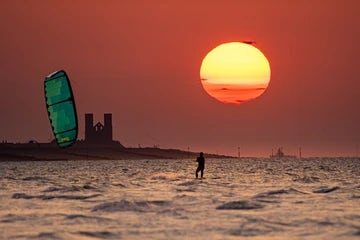 Minnis Bay Sunset over Reculver Towers and windsurfer 2