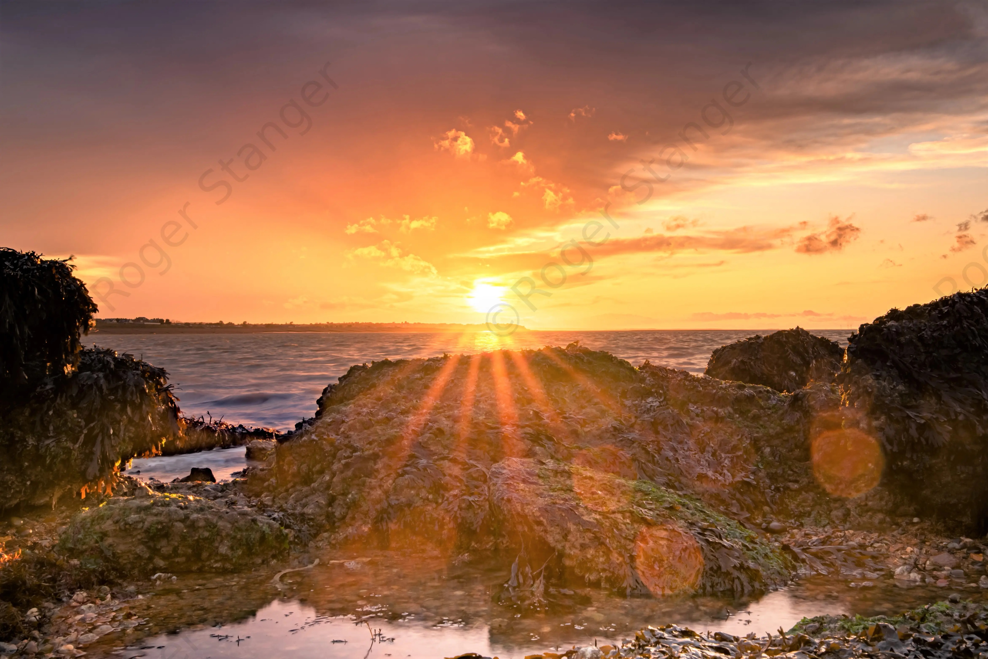 Hampton Sunset Through the Rocks 