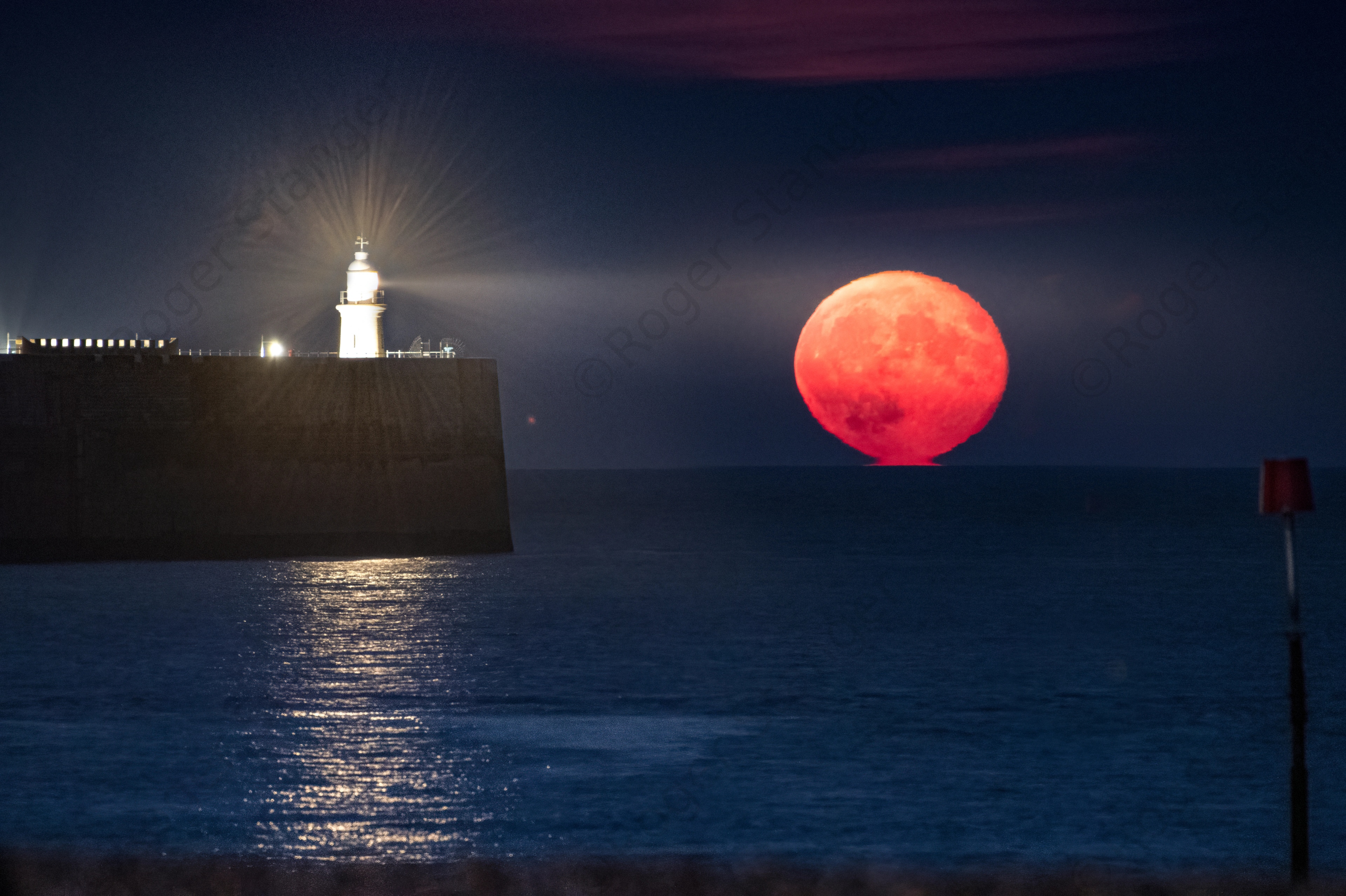 Folkestone Lighthouse And Moonrise From Mermaid 